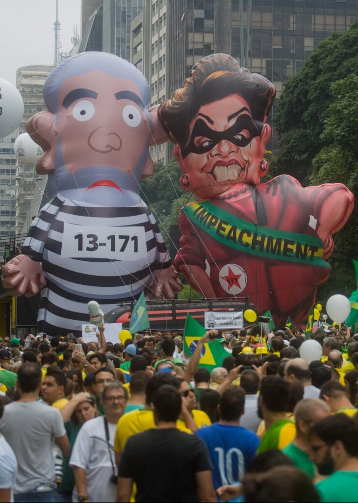 SAO PAULO, BRAZIL - MARCH 13: Protestors demonstrate demanding the removal of President Dilma Rousseff on March 13, 2016 in Sao Paulo, Brazil. Demonstrations across the country today called for President Rousseff's exit amidst a massive corruption scandal and a deep economic recession. (Photo by Victor Moriyama/Getty Images)