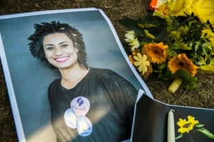 A makeshift memorial is pictured during a protest of Brazilian expats against the killing of Rio de Janeiro's left councilwoman and activist Marielle Franco in Berlin, Germany on March 18, 2018. Marielle Franco, who criticised openly racism and police brutality, was shot with his driver Anderson Pedro Gomes in the city center of Rio de Janeiro in the evening of March 14, 2018. (Photo by Emmanuele Contini/NurPhoto/Sipa USA)(Sipa via AP Images)