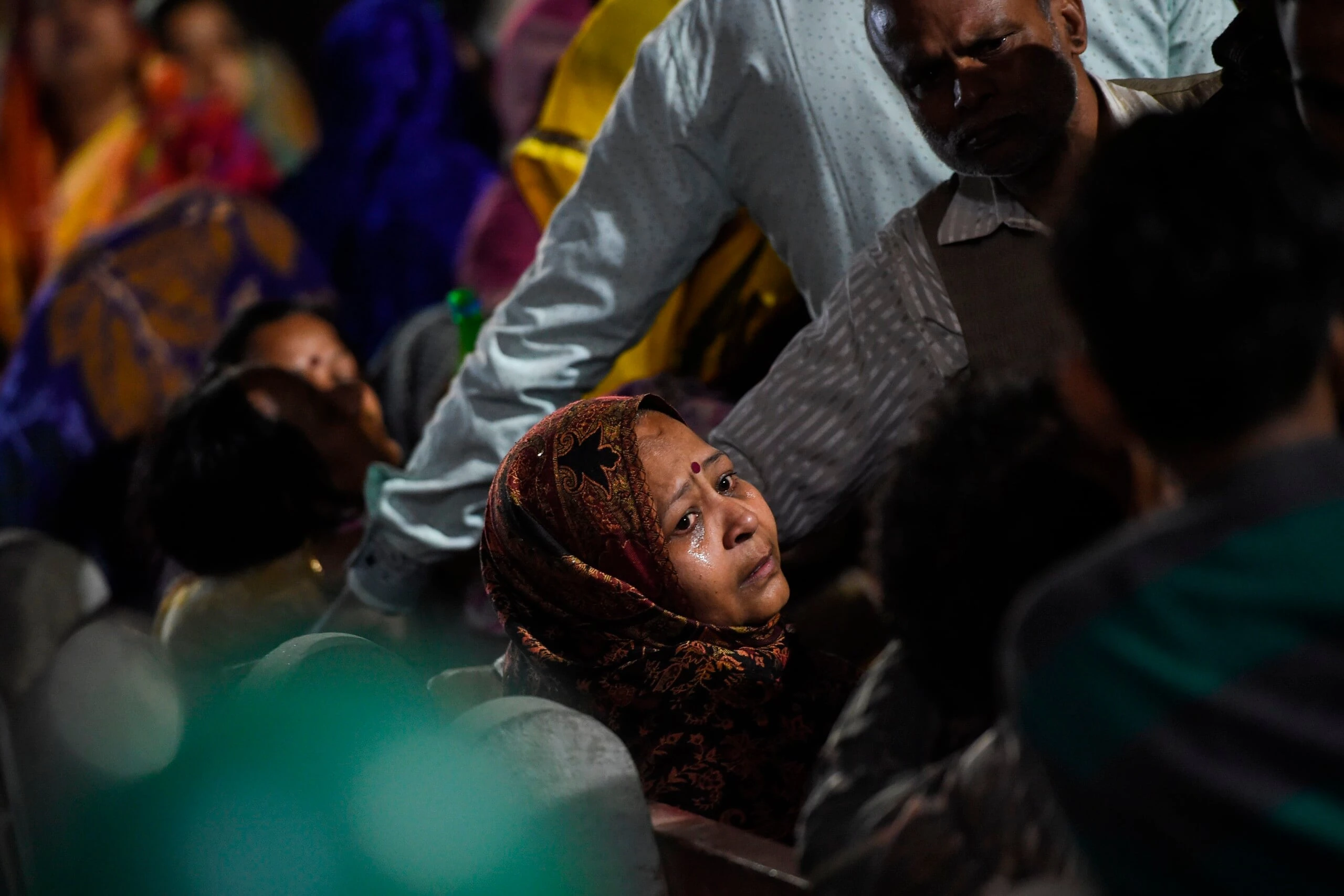 A relative of Rahul Thakur, 23, who died in this week's sectarian riots in India's capital over Prime Minister Narendra Modi's citizenship law, mourns before his cremation in New Delhi February 27, 2020. - Sporadic violence hit parts of Delhi overnight as gangs roamed streets littered with the debris of days of sectarian riots that have killed 38 people, police said on February 27. Thousands of riot police and paramilitaries patrolled the affected northeast fringes of the Indian capital of 20 million people, preventing any major eruptions however. (Photo by Money SHARMA / AFP) (Photo by MONEY SHARMA/AFP via Getty Images)