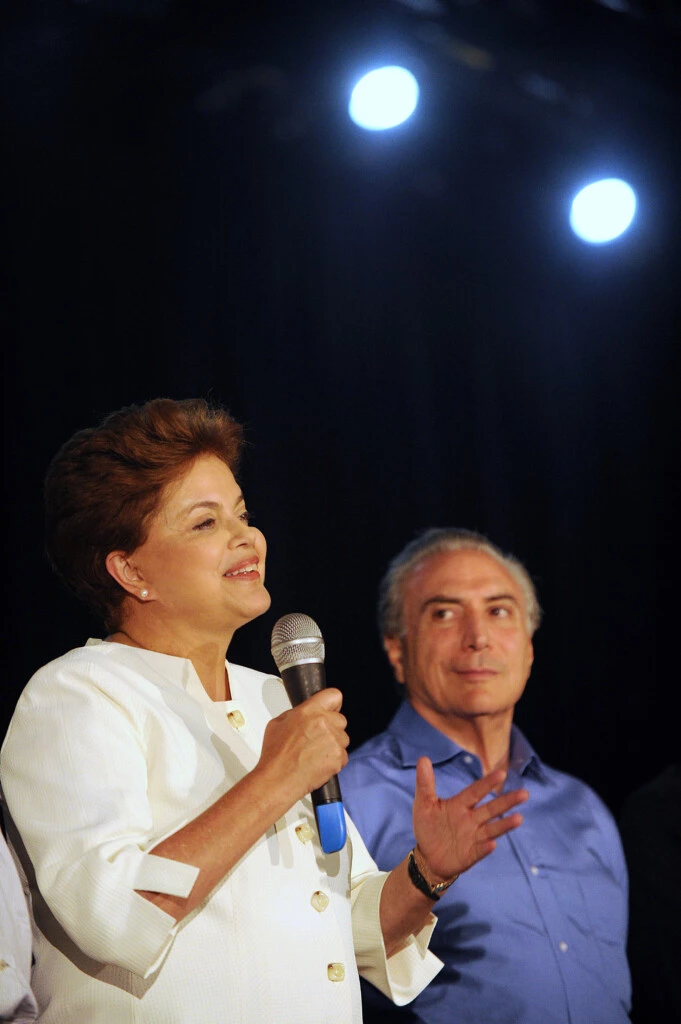 Brazilian presidential candidate for the ruling Workers' Party (PT), Dilma Rousseff and her running mate Michel Temer from the Brazilian Democratic Movement Party (PMDB) speak after receiving the results of the country's general elections, in Brasilia, October 3, 2010. Brazil's presidential election is to go to an October 31 runoff after the ruling party candidate, Dilma Rousseff, won elections on October 3 but not by enough to avoid a second round, the High Electoral Tribunal said. AFP PHOTO/EVARISTO SA (Photo credit should read EVARISTO SA/AFP/Getty Images)