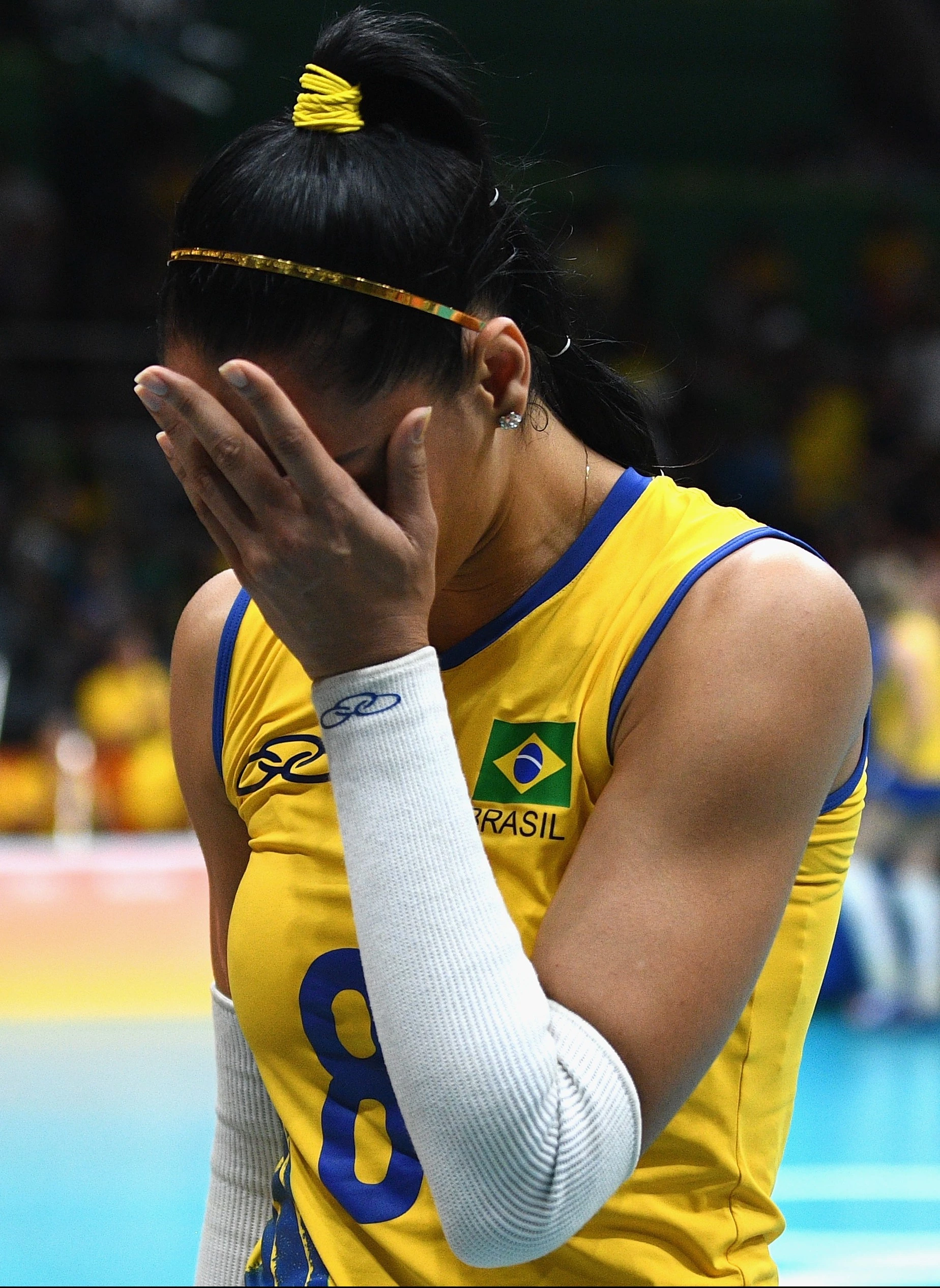 RIO DE JANEIRO, BRAZIL - AUGUST 17: Jaqueline de Carvalho Endres of Brazil cries after being defeated by China during the Women's Quarterfinal match between China and Brazil on day 11 of the Rio 2106 Olympic Games at the Maracanazinho on August 17, 2016 in Rio de Janeiro, Brazil. (Photo by David Ramos/Getty Images)