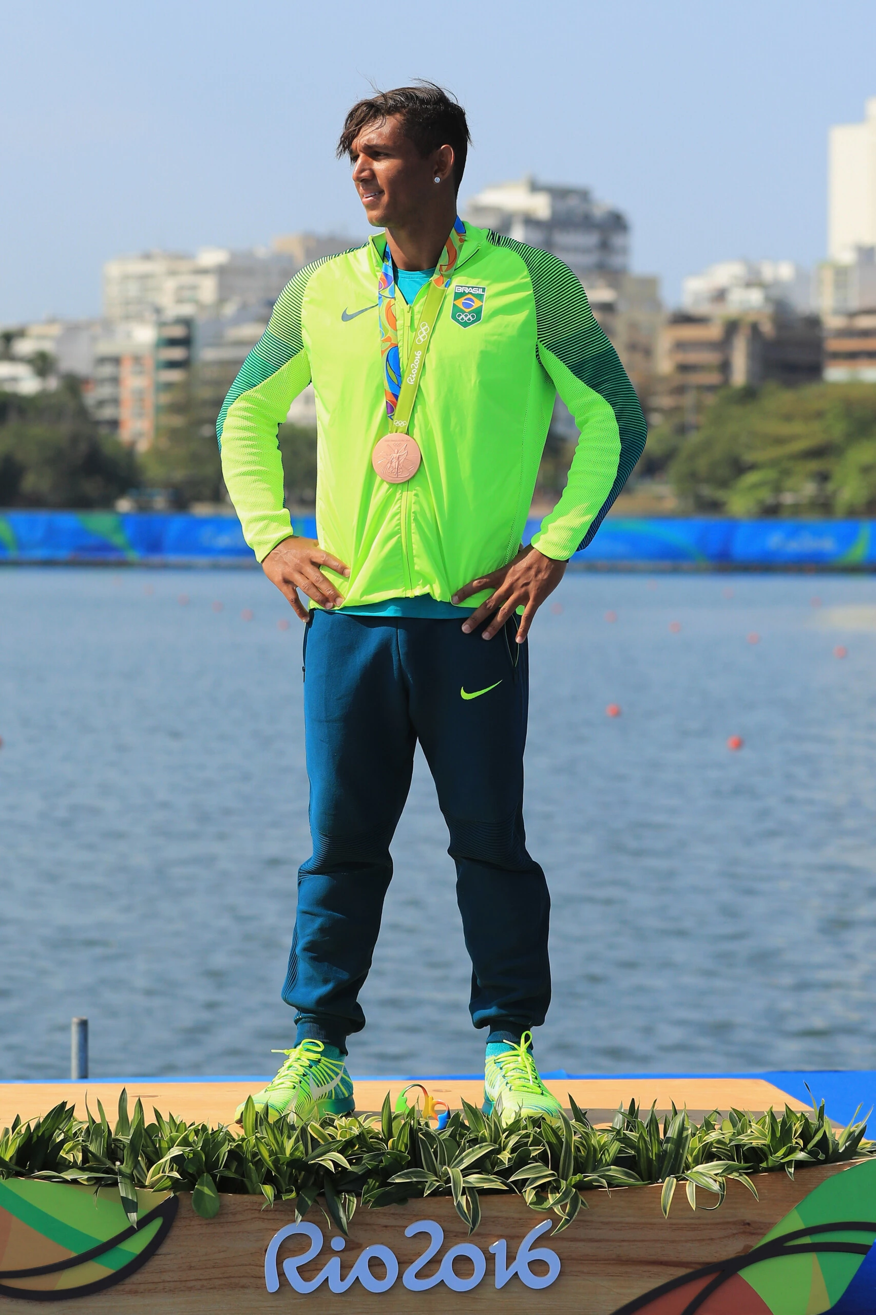 RIO DE JANEIRO, BRAZIL - AUGUST 18: Bronze medalist Isaquias Queiroz dos Santos of Brazil stands on the podium during the medal ceremony for the Men's Canoe Single 200m event at the Lagoa Stadium on Day 13 of the 2016 Rio Olympic Games on August 18, 2016 in Rio de Janeiro, Brazil. (Photo by Mike Ehrmann/Getty Images)