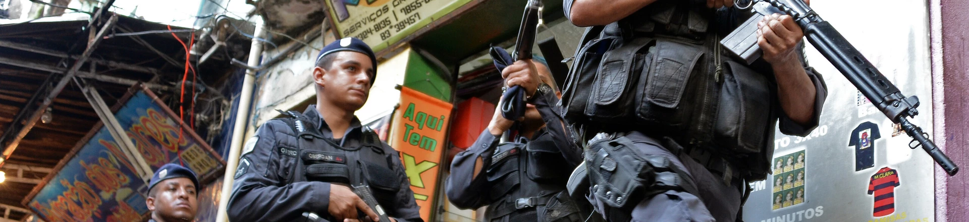 Brazilian BOPE police elite unit personnel patrol during an operation at Rocinha shantytown in Rio de Janeiro, Brazil on April 12, 2013. AFP PHOTO/VANDERLEI ALMEIDA (Photo credit should read VANDERLEI ALMEIDA/AFP/Getty Images) Brazilian BOPE police elite unit personnel patrol during an operation at Rocinha shantytown in Rio de Janeiro, Brazil on April 12, 2013. AFP PHOTO/VANDERLEI ALMEIDA (Photo credit should read VANDERLEI ALMEIDA/AFP/Getty Images)