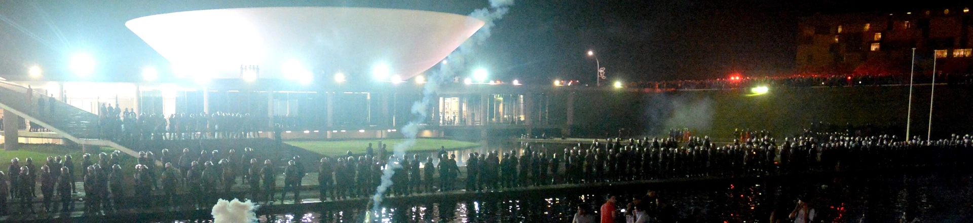 Police use tear gas against demonstrators during a protest against government waste and corruption, and the use of public funds to organize international football tournaments in front of the National Congress in Brasilia, on June 26, 2013. Brazil is currently facing unprecedented social unrest, marked by almost daily street protests to demand better public services and an end to rampant political corruption, the protests come as Brazil hosts the FIFA 2013 Confederations Cup. AFP PHOTO / (Photo credit should read EVARISTO SA/AFP/Getty Images) Police use tear gas against demonstrators during a protest against government waste and corruption, and the use of public funds to organize international football tournaments in front of the National Congress in Brasilia, on June 26, 2013. Brazil is currently facing unprecedented social unrest, marked by almost daily street protests to demand better public services and an end to rampant political corruption, the protests come as Brazil hosts the FIFA 2013 Confederations Cup. AFP PHOTO / (Photo credit should read EVARISTO SA/AFP/Getty Images)