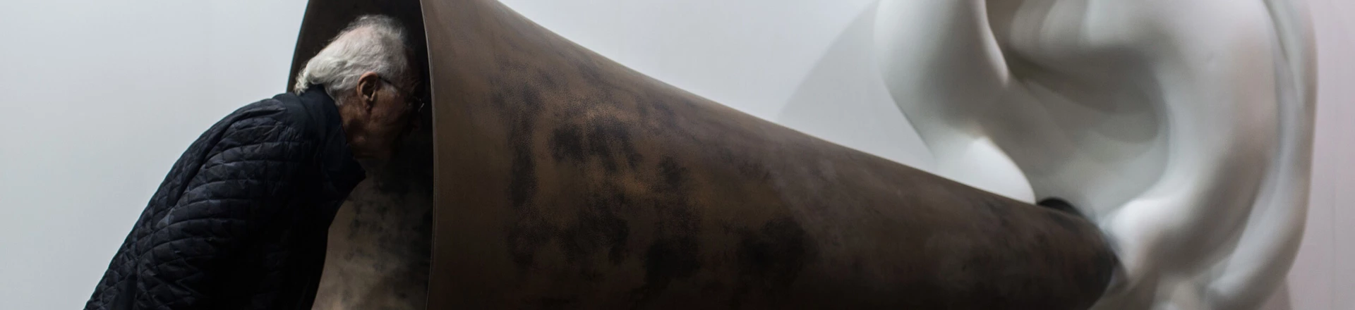 A visitor peers into US artist John Baldessari's "Beethoven's Trumpet (With Ear) Opus # 133" at the Art Basel fair in Hong Kong on March 15, 2015. Hong Kong's biggest art fair, Art Basel, opened its doors with thousands of visitors expected for a city-wide canvas of creativity and commerce. AFP PHOTO / ANTHONY WALLACEMANDATORY MENTION OF THE ARTIST, TO ILLUSTRATE THE EVENT AS SPECIFIED IN THE CAPTION (Photo credit should read ANTHONY WALLACE/AFP/Getty Images) A visitor peers into US artist John Baldessari's "Beethoven's Trumpet (With Ear) Opus # 133" at the Art Basel fair in Hong Kong on March 15, 2015. Hong Kong's biggest art fair, Art Basel, opened its doors with thousands of visitors expected for a city-wide canvas of creativity and commerce. AFP PHOTO / ANTHONY WALLACEMANDATORY MENTION OF THE ARTIST, TO ILLUSTRATE THE EVENT AS SPECIFIED IN THE CAPTION (Photo credit should read ANTHONY WALLACE/AFP/Getty Images)