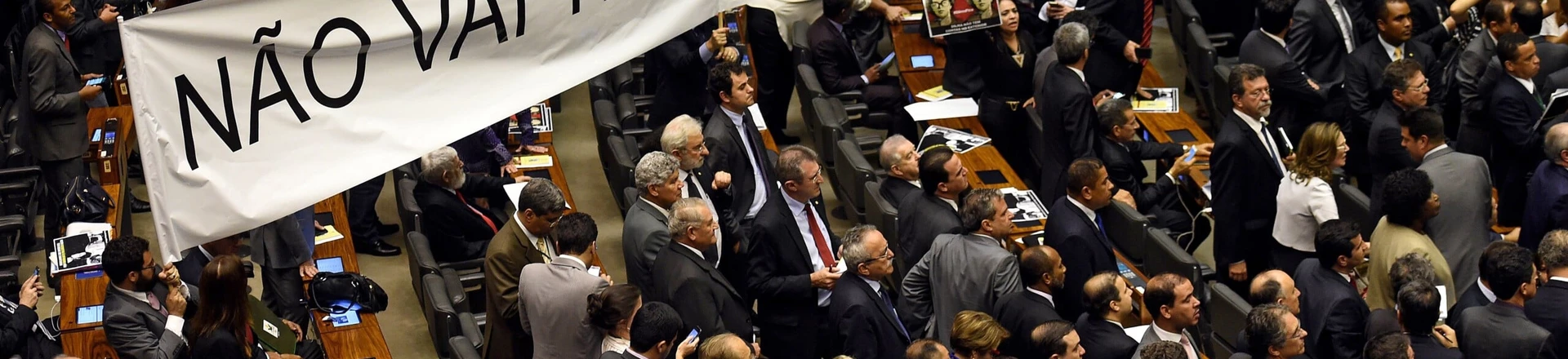 Brazilian pro-government deputies hold a banner reading "There will not be a coup" during the election of members for a special congressional commission that will be first up to analyze the impeachment case against President Dilma Rousseff, at the National Congress in Brasilia, on December 8, 2015. Pro-impeachment deputies got 39 out of 65 seats on the commission, which is tasked with making a recommendation to the full lower house on Rousseff's impeachment. AFP PHOTO/EVARISTO SA / AFP / EVARISTO SA (Photo credit should read EVARISTO SA/AFP/Getty Images) Brazilian pro-government deputies hold a banner reading "There will not be a coup" during the election of members for a special congressional commission that will be first up to analyze the impeachment case against President Dilma Rousseff, at the National Congress in Brasilia, on December 8, 2015. Pro-impeachment deputies got 39 out of 65 seats on the commission, which is tasked with making a recommendation to the full lower house on Rousseff's impeachment. AFP PHOTO/EVARISTO SA / AFP / EVARISTO SA (Photo credit should read EVARISTO SA/AFP/Getty Images)
