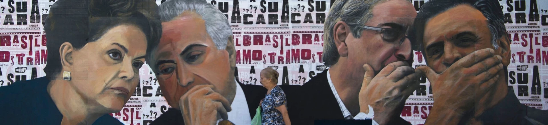 A woman walks past a mural depicting the president of the Brazilian lower house of Congress Eduardo Cunha (2-R) speaking with the president of the Brazilian Social Democracy Party (PSDB) Aecio Neves (R) as if they were conspiring against Brazilian President Dilma Rousseff (L), who is depicted speaking with Vice-President Michel Temer, at Paulista Avenue in Sao Paulo, Brazil on April 19, 2016.Brazil woke Monday to deep political crisis after lawmakers authorized impeachment proceedings against President Dilma Rousseff, sparking claims that democracy was under threat in Latin America's biggest country. / AFP / NELSON ALMEIDA (Photo credit should read NELSON ALMEIDA/AFP/Getty Images) A woman walks past a mural depicting the president of the Brazilian lower house of Congress Eduardo Cunha (2-R) speaking with the president of the Brazilian Social Democracy Party (PSDB) Aecio Neves (R) as if they were conspiring against Brazilian President Dilma Rousseff (L), who is depicted speaking with Vice-President Michel Temer, at Paulista Avenue in Sao Paulo, Brazil on April 19, 2016.Brazil woke Monday to deep political crisis after lawmakers authorized impeachment proceedings against President Dilma Rousseff, sparking claims that democracy was under threat in Latin America's biggest country. / AFP / NELSON ALMEIDA (Photo credit should read NELSON ALMEIDA/AFP/Getty Images)