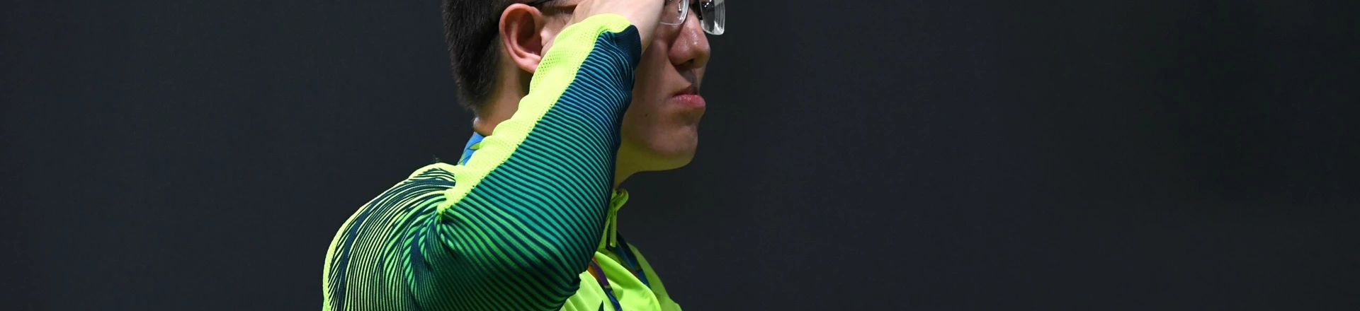 Brazil's silver medal winner Felipe Almeida Wu poses on the podium during the medal ceremony for the men's 10m air pistol shooting event at the Rio 2016 Olympic Games at the Olympic Shooting Centre in Rio de Janeiro on August 6, 2016. / AFP / Pascal GUYOT (Photo credit should read PASCAL GUYOT/AFP/Getty Images) Brazil's silver medal winner Felipe Almeida Wu poses on the podium during the medal ceremony for the men's 10m air pistol shooting event at the Rio 2016 Olympic Games at the Olympic Shooting Centre in Rio de Janeiro on August 6, 2016. / AFP / Pascal GUYOT (Photo credit should read PASCAL GUYOT/AFP/Getty Images)