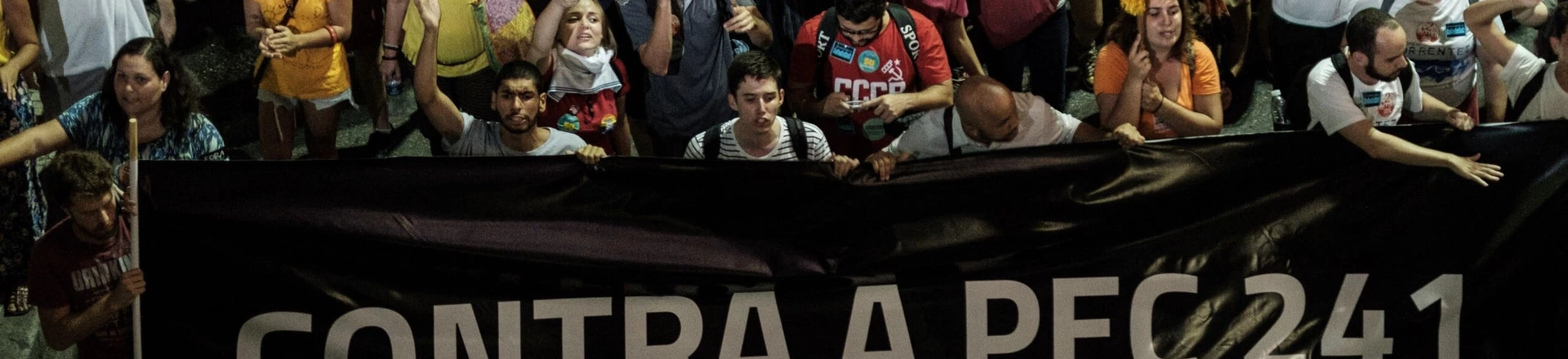 Opposers to President Michel Temer's economic recovery program, march against the constitutional amendment (PEC) 241, in Rio de Janeiro, Brazil, on October 17, 2016.Approved by Brazils lower house, the constitutional amendment limits budget increases to the rate of inflation for the next 20 years. Leftist lawmakers had fought against the spending cap, arguing that it would dramatically worsen conditions for ordinary Brazilians, especially the poor. / AFP / YASUYOSHI CHIBA (Photo credit should read YASUYOSHI CHIBA/AFP/Getty Images) Opposers to President Michel Temer's economic recovery program, march against the constitutional amendment (PEC) 241, in Rio de Janeiro, Brazil, on October 17, 2016.Approved by Brazils lower house, the constitutional amendment limits budget increases to the rate of inflation for the next 20 years. Leftist lawmakers had fought against the spending cap, arguing that it would dramatically worsen conditions for ordinary Brazilians, especially the poor. / AFP / YASUYOSHI CHIBA (Photo credit should read YASUYOSHI CHIBA/AFP/Getty Images)