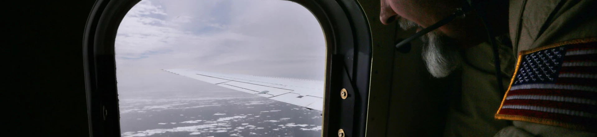 Lyn Lohberger of NASA looks out as sea ice floats near the coast of West Antarctica from a window of a NASA Operation IceBridge airplane on October 27, 2016 in-flight over Antarctica. NASA's Operation IceBridge has been studying how polar ice has evolved over the past eight years. Researchers have used the IceBridge data to observe that the West Antarctic Ice Sheet may be in a state of irreversible decline directly contributing to rising sea levels. Lyn Lohberger of NASA looks out as sea ice floats near the coast of West Antarctica from a window of a NASA Operation IceBridge airplane on October 27, 2016 in-flight over Antarctica. NASA's Operation IceBridge has been studying how polar ice has evolved over the past eight years. Researchers have used the IceBridge data to observe that the West Antarctic Ice Sheet may be in a state of irreversible decline directly contributing to rising sea levels.