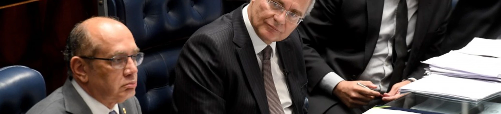 Supreme Court's Judge Gilmar Mendes (L), Senate's President Renan Calheiros (C) and Federal Judge Sergio Moro attend a public hearing on the bill that establishes the abuse of authority for judges and prosecutors, in the Senate in Brasilia on December 1, 2016.Even with a strong reaction against the bill from the public, Calheiros tries to speed up approval in the Senate and Lower House. The controversial law is ostensibly meant to crack down on undeclared election campaign funds, a common practice in Brazilian politics that has been linked to large-scale corruption. Judges and prosecutors have branded this as a weapon to reduce the judiciary's independence. / AFP / EVARISTO SA (Photo credit should read EVARISTO SA/AFP/Getty Images) Supreme Court's Judge Gilmar Mendes (L), Senate's President Renan Calheiros (C) and Federal Judge Sergio Moro attend a public hearing on the bill that establishes the abuse of authority for judges and prosecutors, in the Senate in Brasilia on December 1, 2016.Even with a strong reaction against the bill from the public, Calheiros tries to speed up approval in the Senate and Lower House. The controversial law is ostensibly meant to crack down on undeclared election campaign funds, a common practice in Brazilian politics that has been linked to large-scale corruption. Judges and prosecutors have branded this as a weapon to reduce the judiciary's independence. / AFP / EVARISTO SA (Photo credit should read EVARISTO SA/AFP/Getty Images)