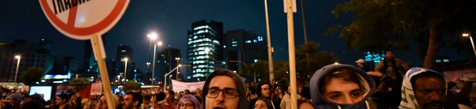 Demonstrators take part in a national strike against a labour and social welfare reform bill that the government of President Michel Temer intends to pass, in Sao Paulo, Brazil, on April 28, 2017.Major transportation networks schools and banks were partially shut down across much of Brazil on Friday in what protesters called a general strike against austerity reforms in Latin America's biggest country. / AFP PHOTO / NELSON ALMEIDA (Photo credit should read NELSON ALMEIDA/AFP/Getty Images) Demonstrators take part in a national strike against a labour and social welfare reform bill that the government of President Michel Temer intends to pass, in Sao Paulo, Brazil, on April 28, 2017.Major transportation networks schools and banks were partially shut down across much of Brazil on Friday in what protesters called a general strike against austerity reforms in Latin America's biggest country. / AFP PHOTO / NELSON ALMEIDA (Photo credit should read NELSON ALMEIDA/AFP/Getty Images)