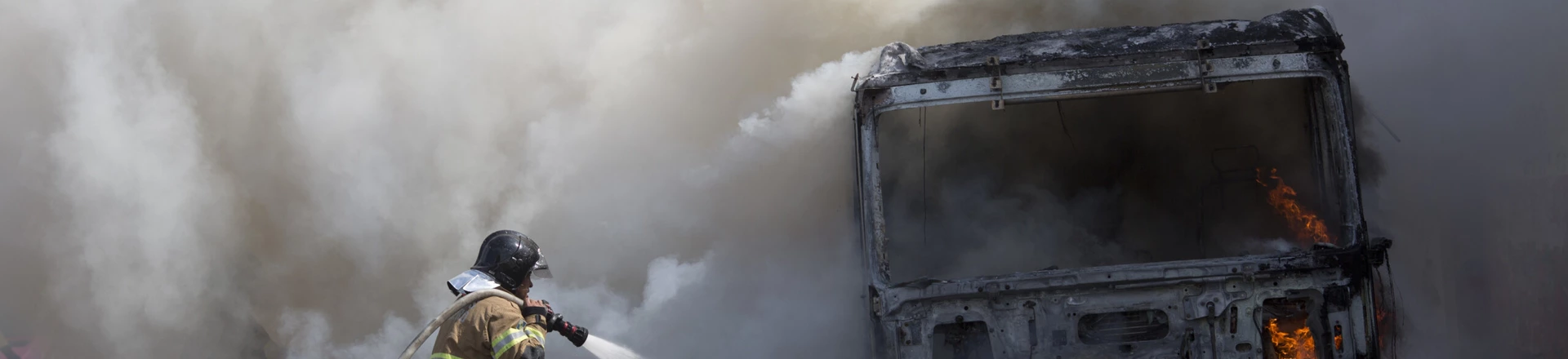 Firefighters work to extinguish a truck allegedly set on fire by drug traffickers in Rio de Janeiro, Brazil, Tuesday, May 2, 2017. Several public buses were torched in Rio de Janeiro on Tuesday in what Brazilian military police said was likely gang retaliation for a large anti-drug operation. (AP Photo/Silvia Izquierdo) Firefighters work to extinguish a truck allegedly set on fire by drug traffickers in Rio de Janeiro, Brazil, Tuesday, May 2, 2017. Several public buses were torched in Rio de Janeiro on Tuesday in what Brazilian military police said was likely gang retaliation for a large anti-drug operation. (AP Photo/Silvia Izquierdo)