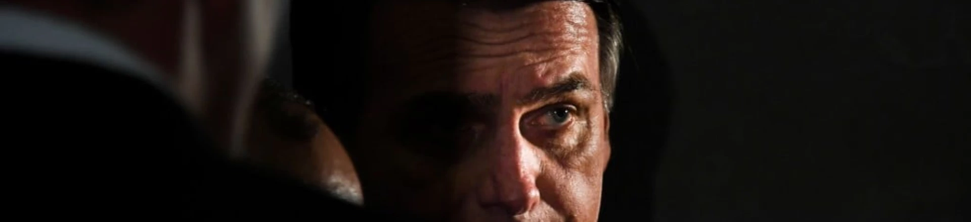 Brazilian deputy Jair Bolsonaro looks on during a press conference he called to announce his intention to run for the Brazilian presidency in the October 2018 presidential election, at a hotel in Rio de Janeiro on August 10, 2017.A controversial politician and former army paratrooper, Bolsonaro called himself the "patriot" Brazil needs, adding he is the answer to Brazil's rampant corruption, crime and economic malaise. He won more votes than any other congressman from Rio de Janeiro state in the last general elections in 2014 and polls currently show him tied in second place for the presidency, behind leftist former two term president Luiz Inacio Lula da Silva. / AFP PHOTO / Apu Gomes (Photo credit should read APU GOMES/AFP/Getty Images) Brazilian deputy Jair Bolsonaro looks on during a press conference he called to announce his intention to run for the Brazilian presidency in the October 2018 presidential election, at a hotel in Rio de Janeiro on August 10, 2017.A controversial politician and former army paratrooper, Bolsonaro called himself the "patriot" Brazil needs, adding he is the answer to Brazil's rampant corruption, crime and economic malaise. He won more votes than any other congressman from Rio de Janeiro state in the last general elections in 2014 and polls currently show him tied in second place for the presidency, behind leftist former two term president Luiz Inacio Lula da Silva. / AFP PHOTO / Apu Gomes (Photo credit should read APU GOMES/AFP/Getty Images)