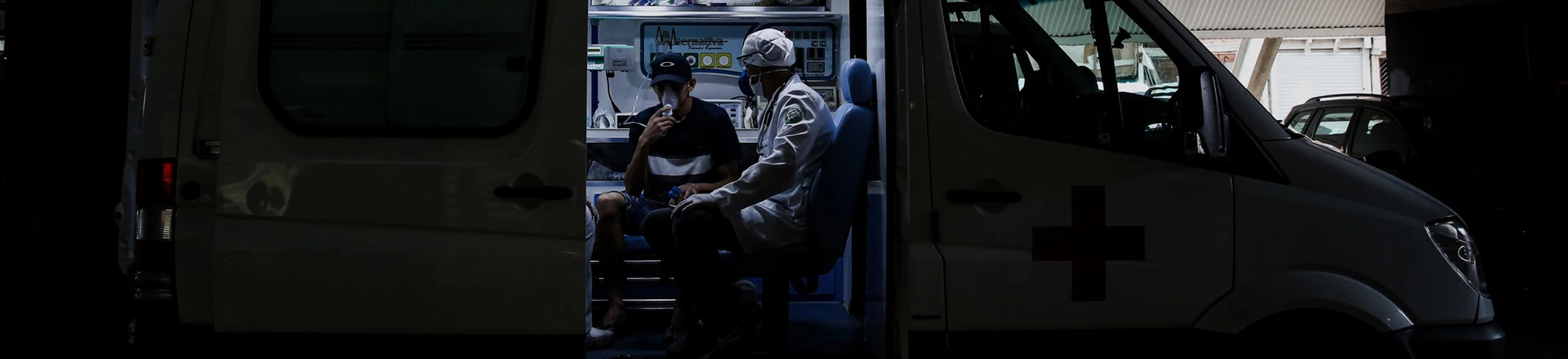 Ricardo Vieira, 41 years old surgeon attends a resident of Paraisopolis, Felipe dos Santos, 23 years old unemployed on April 7, 2020 in Sao Paulo, Brazil. Ricardo Vieira, 41 years old surgeon attends a resident of Paraisopolis, Felipe dos Santos, 23 years old unemployed on April 7, 2020 in Sao Paulo, Brazil.