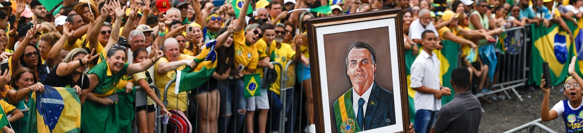 SAO GONCALO, BRAZIL - OCTOBER 18: A supporter displays a painting of President of Brazil and presidential candidate Jair Bolsonaro during a rally organized by Liberal Party as part of the campaign ahead of presidential run-off on October 18, 2022 in Sao Goncalo, Brazil. (Photo by Buda Mendes/Getty Images) SAO GONCALO, BRAZIL - OCTOBER 18: A supporter displays a painting of President of Brazil and presidential candidate Jair Bolsonaro during a rally organized by Liberal Party as part of the campaign ahead of presidential run-off on October 18, 2022 in Sao Goncalo, Brazil. (Photo by Buda Mendes/Getty Images)