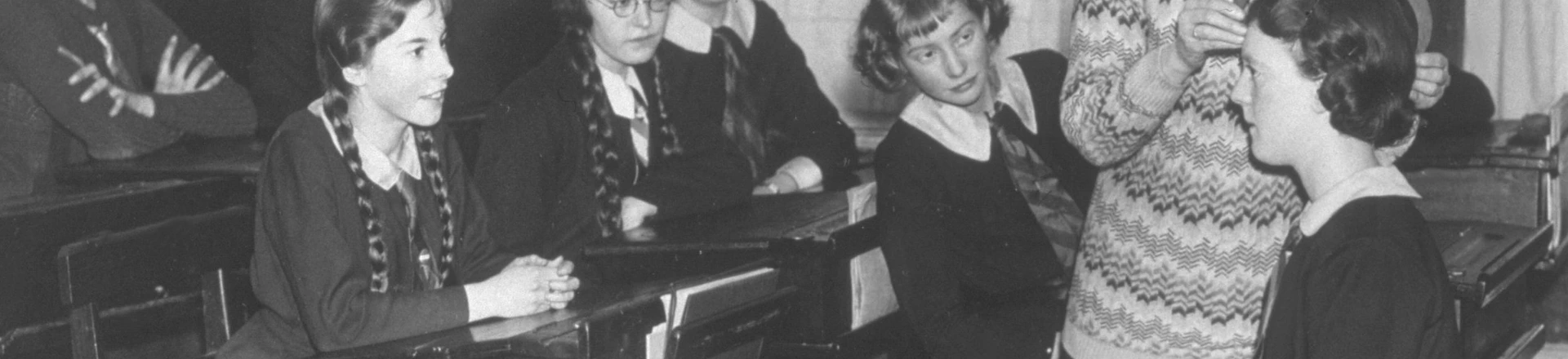 circa 1937: A phrenologist, who reads the 'bumps' on people's heads, demonstrating how to measure a head to a class of schoolgirls. (Photo by Hulton Archive/Getty Images) circa 1937: A phrenologist, who reads the 'bumps' on people's heads, demonstrating how to measure a head to a class of schoolgirls. (Photo by Hulton Archive/Getty Images)