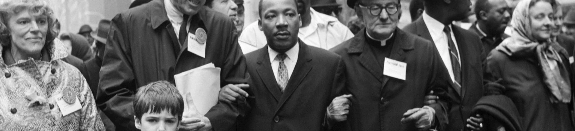 NEW YORK, UNITED STATES: Civil rights leader Rev. Martin Luther King, Jr., (C) is accompanied by famed pediatrician Dr. Benjamin Spock (2nd-L), Father Frederick Reed (3rd-R) and union leader Cleveland Robinson (2nd-R) 16 March, 1967, during an anti-Vietnam War demonstration in New York. The US is celebrating in 2004 what would have been King's 75th birthday. King was assassinated on 04 April, 1968, in Memphis, Tennessee. AFP PHOTO (Photo credit should read AFP/AFP/Getty Images) NEW YORK, UNITED STATES: Civil rights leader Rev. Martin Luther King, Jr., (C) is accompanied by famed pediatrician Dr. Benjamin Spock (2nd-L), Father Frederick Reed (3rd-R) and union leader Cleveland Robinson (2nd-R) 16 March, 1967, during an anti-Vietnam War demonstration in New York. The US is celebrating in 2004 what would have been King's 75th birthday. King was assassinated on 04 April, 1968, in Memphis, Tennessee. AFP PHOTO (Photo credit should read AFP/AFP/Getty Images)