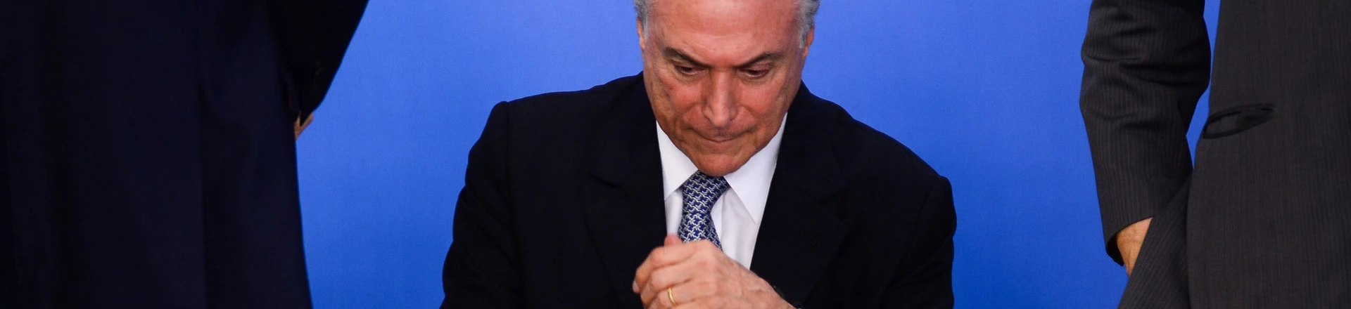 TOPSHOT - Brazilian acting President Michel Temer attends a meeting with business leaders next to his Finance Minister Henrique Meirelles (out of frame) at Planalto Palace in Brasilia, June 8, 2016.
Brazil's annual inflation rate crept up last month to 9.32 percent, officials said Wednesday, sounding new alarm bells for Latin America's largest economy as it struggles through a deep recession. The stubbornly high inflation rate had been looking somewhat better recently, falling in each of the past three months, to 9.28 percent in April. / AFP / ANDRESSA ANHOLETE (Photo credit should read ANDRESSA ANHOLETE/AFP/Getty Images) TOPSHOT - Brazilian acting President Michel Temer attends a meeting with business leaders next to his Finance Minister Henrique Meirelles (out of frame) at Planalto Palace in Brasilia, June 8, 2016.
Brazil's annual inflation rate crept up last month to 9.32 percent, officials said Wednesday, sounding new alarm bells for Latin America's largest economy as it struggles through a deep recession. The stubbornly high inflation rate had been looking somewhat better recently, falling in each of the past three months, to 9.28 percent in April. / AFP / ANDRESSA ANHOLETE (Photo credit should read ANDRESSA ANHOLETE/AFP/Getty Images)