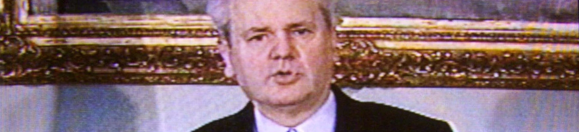 Yugoslav President Slobodan Milosevic delivers March 24 a nationwide television address. Milosevic said his government was right to reject foreign troops in Kosovo and urged Yugoslavs to stand firm against possible NATO air strikes.RS//ME - RTRN932 Yugoslav President Slobodan Milosevic delivers March 24 a nationwide television address. Milosevic said his government was right to reject foreign troops in Kosovo and urged Yugoslavs to stand firm against possible NATO air strikes.RS//ME - RTRN932