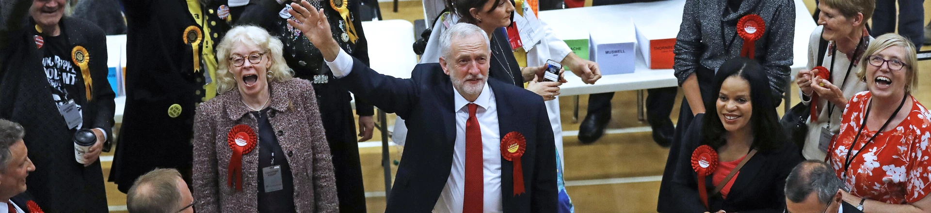 Britain's Labour party leader Jeremy Corbyn, bottom center, waves after arriving for the declaration at his constituency in London, Friday, June 9, 2017. Britain voted Thursday in an election that started out as an attempt by Prime Minister Theresa May to increase her party's majority in Parliament ahead of Brexit negotiations but was upended by terror attacks in Manchester and London during the campaign's closing days. (AP Photo/Frank Augstein) Britain's Labour party leader Jeremy Corbyn, bottom center, waves after arriving for the declaration at his constituency in London, Friday, June 9, 2017. Britain voted Thursday in an election that started out as an attempt by Prime Minister Theresa May to increase her party's majority in Parliament ahead of Brexit negotiations but was upended by terror attacks in Manchester and London during the campaign's closing days. (AP Photo/Frank Augstein)