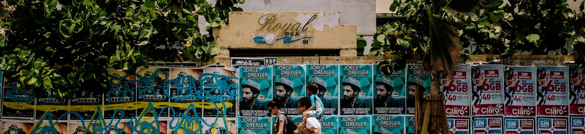 Pedestrians walk past an old hotel in the Condado area of San Juan, Puerto Rico, on Wednesday, July 8, 2015. A growing number of Republicans in the U.S. Congress are saying they want to support Puerto Rico as it wrestles with an escalating debt crisis, though they've stopped short of backing legislation allowing for municipal bankruptcy. Photographer: Christopher Gregory/Bloomberg via Getty Images Pedestrians walk past an old hotel in the Condado area of San Juan, Puerto Rico, on Wednesday, July 8, 2015. A growing number of Republicans in the U.S. Congress are saying they want to support Puerto Rico as it wrestles with an escalating debt crisis, though they've stopped short of backing legislation allowing for municipal bankruptcy. Photographer: Christopher Gregory/Bloomberg via Getty Images